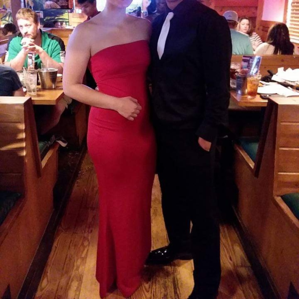 Fitted red strapless gown